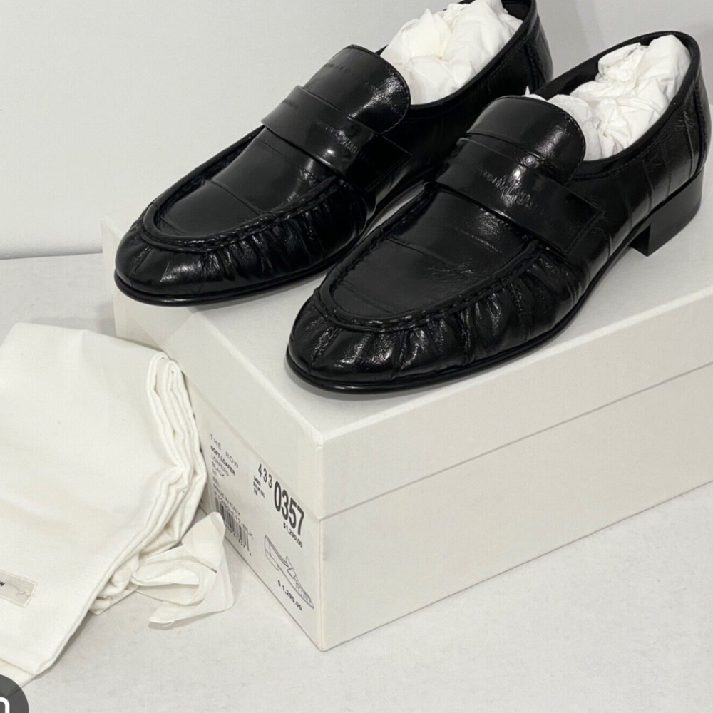 The row soft loafers black eel